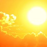 a bright sun in the sky