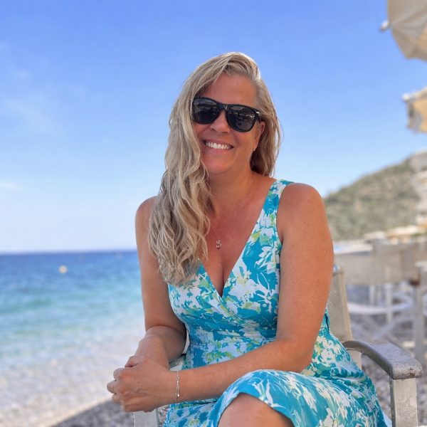 Brenda sitting by the sea.